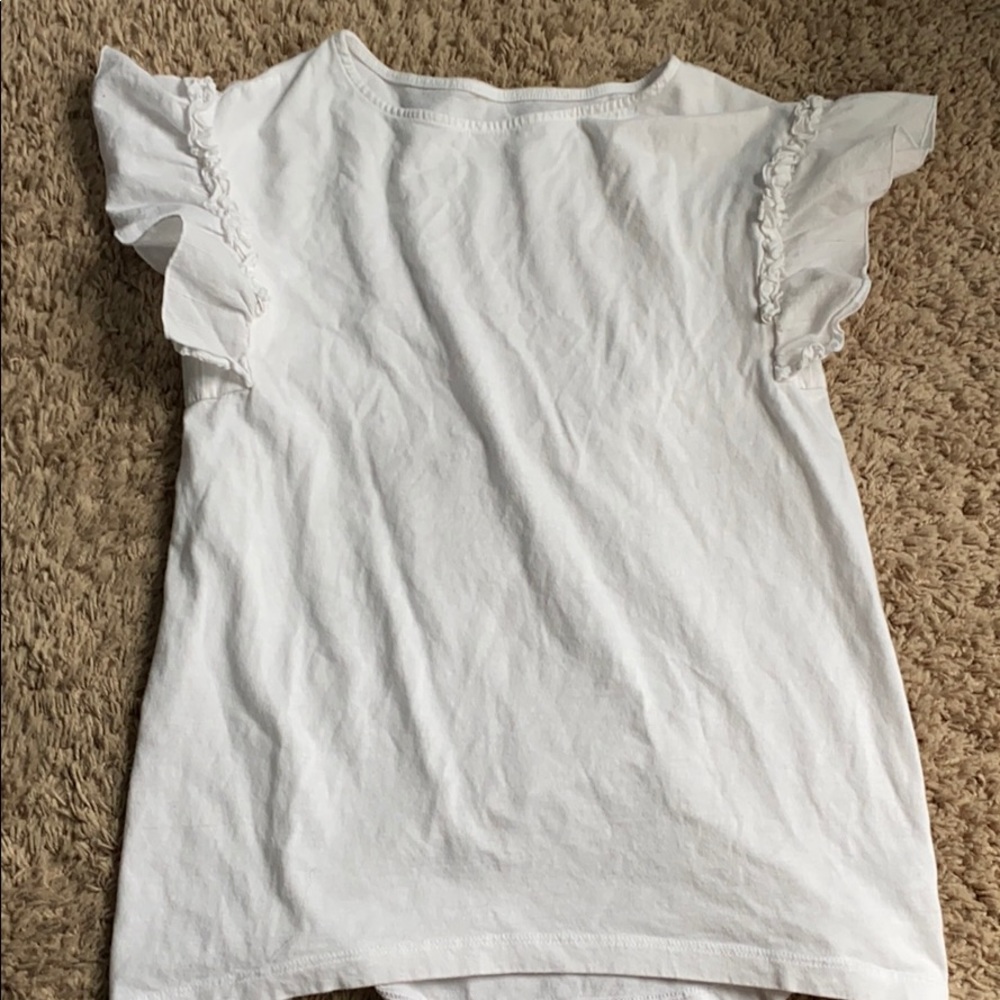 White shirt with ruffle sleeves